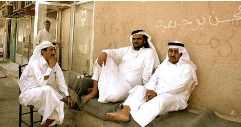 3 Qatari men relax in Doha