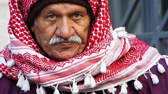 He is wearing a _________ scarf?