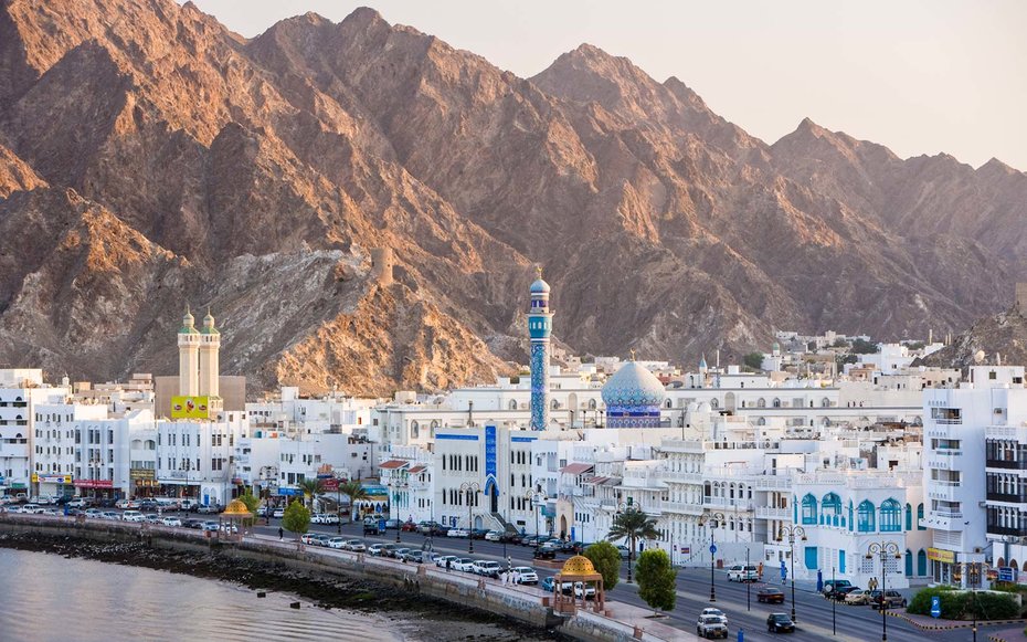 Oman, Muscat, Mutrah, Elevated view along Corniche, latticed houses and Mutrah Mosque